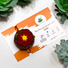 Load image into Gallery viewer, Premium Plantable Flower Crochet Rakhi with Sunflower Seeds | Colour Red | Combo with a DIY Grow Kit
